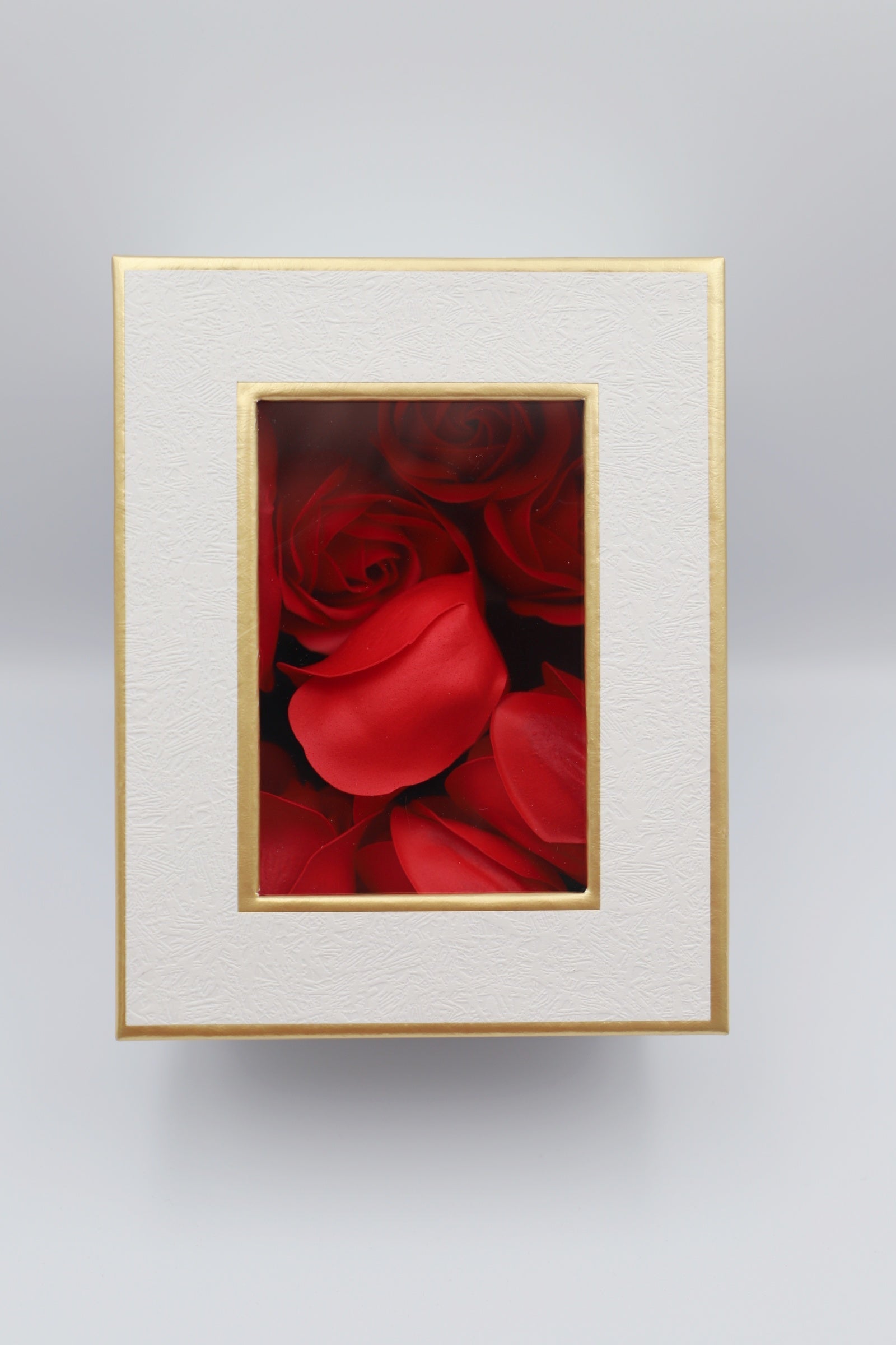 White gift box red petals