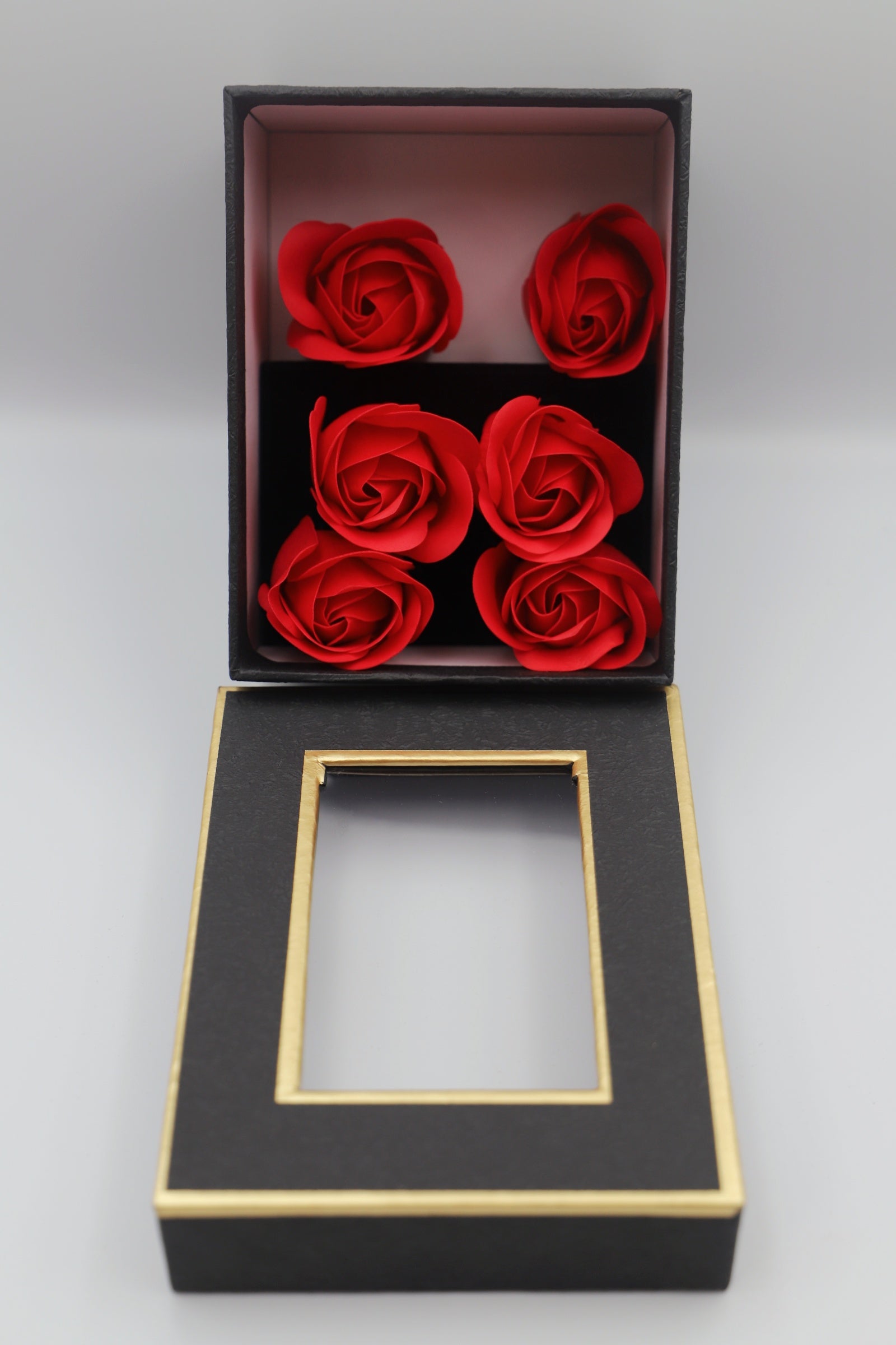 Black gift box red petals