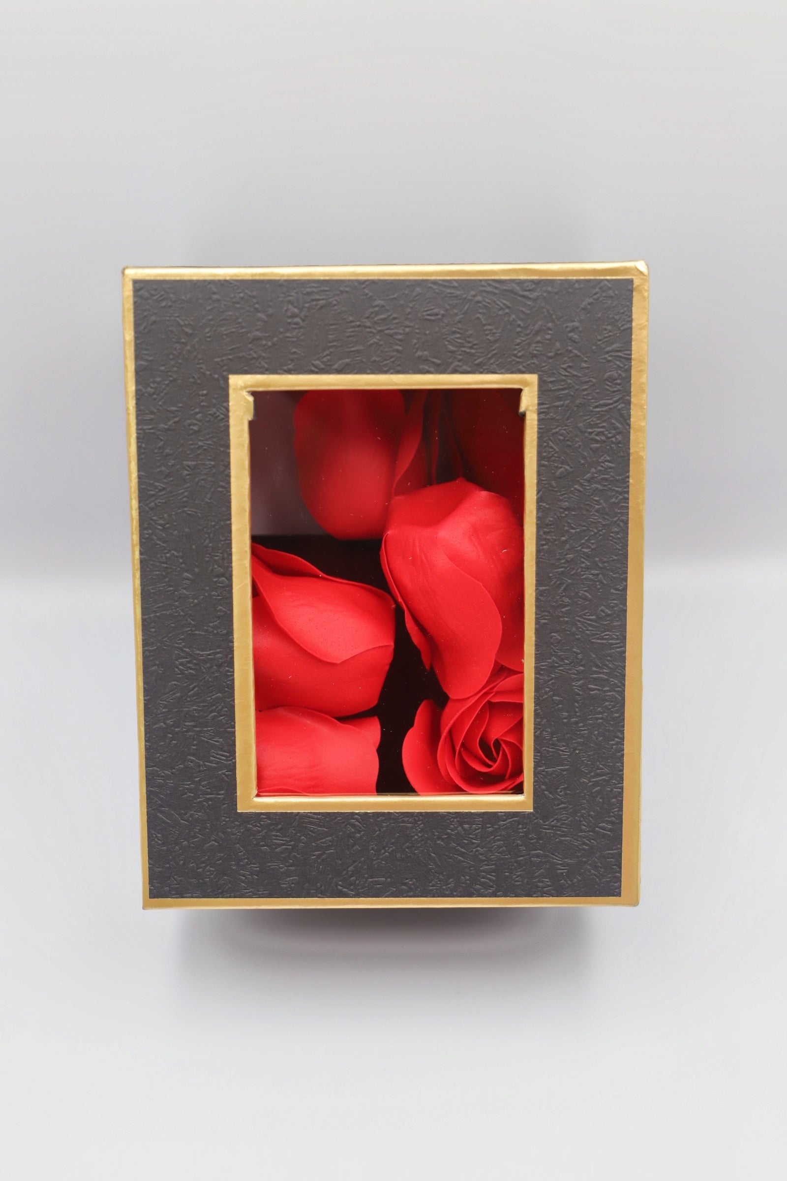 Black gift box red petals